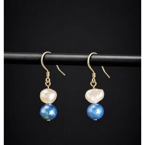 Sterling silver drop-style earrings with genuine white and blue pearls.